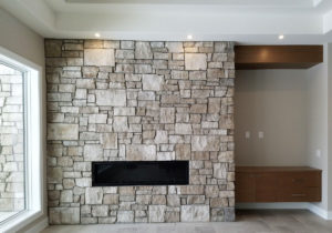stone fireplace with built-ins